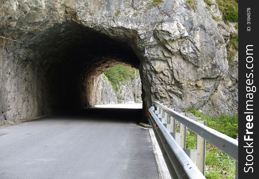 Native rock road tunnel in italy. Native rock road tunnel in italy