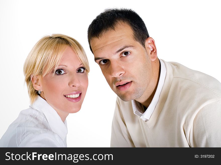Casual portrait of a happy couple in 20s, white isolated