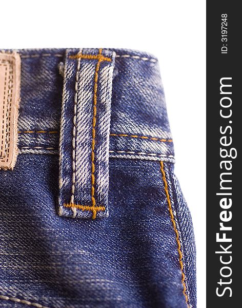 Detail shot of Fashionable faded light blue denim jeans. Detail shot of Fashionable faded light blue denim jeans.