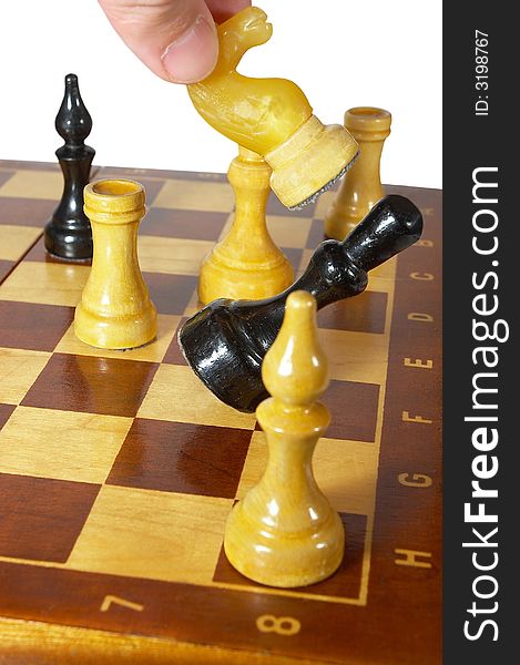 Game on a chessboard. Falling of a chess figure. Game on a chessboard. Falling of a chess figure.