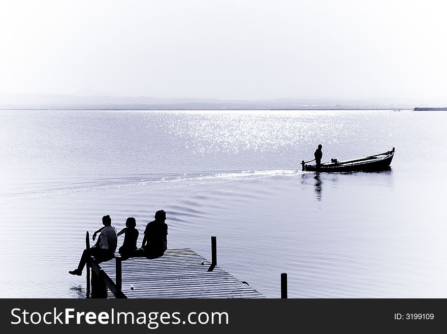 ThatÂ´s the life in the Albufera, lonely old fishermen and family turist groups relaxing. ThatÂ´s the life in the Albufera, lonely old fishermen and family turist groups relaxing.