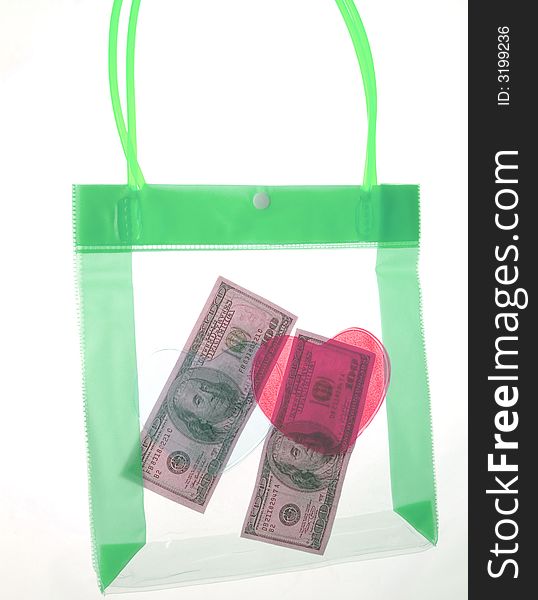Dollars in a transparent package on a white background. Dollars in a transparent package on a white background