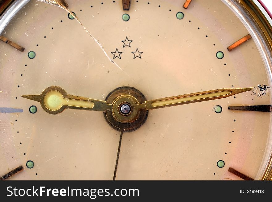 Close-up of an old and cracked clock. Close-up of an old and cracked clock