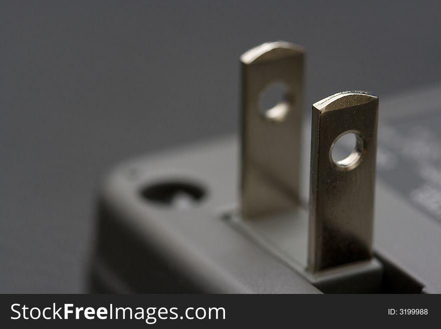 Closeup of the pins of an US charger, plug