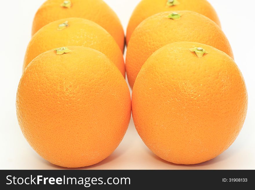 Photographed the group of oranges on a white background. Photographed the group of oranges on a white background