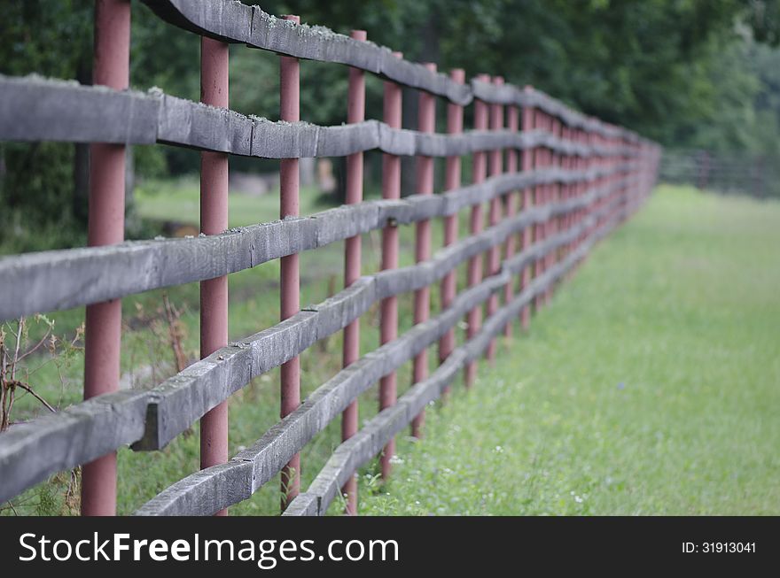 A wooden fence log in a forrest near Targoviste, Romania