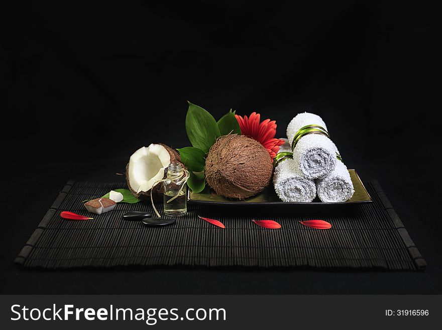 Spa composition with coconut, flowers and coconut oil