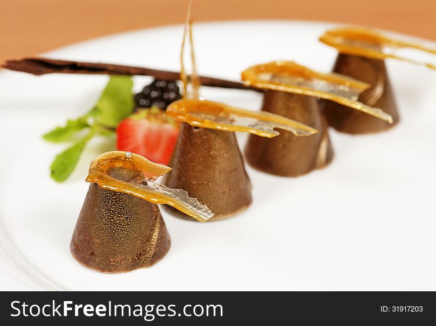 Hand made candy on white plate. Hand made candy on white plate