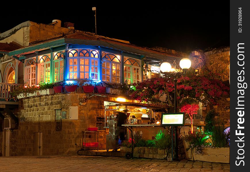 Colorful lights from a restaurant in the old town