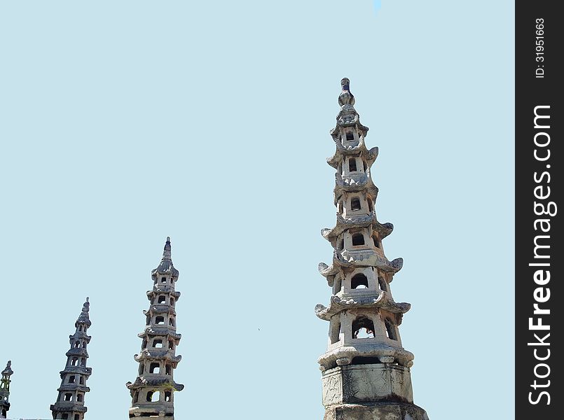 Ta is a chinese pagoda with octagonal shaped buildings , They can be seen in Wat Suthat and the temple of Dawn , Bangkok , Thailand.