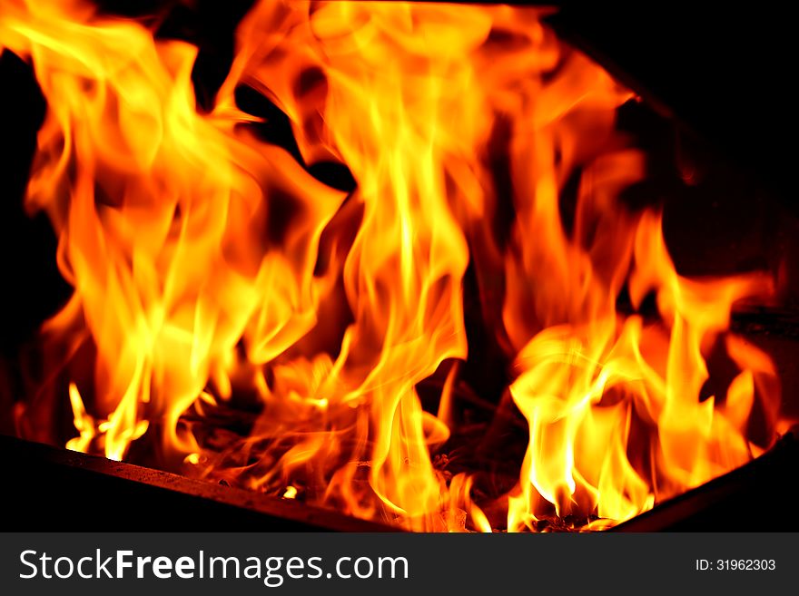 Blaze fire flame texture on a whole background. Blaze fire flame texture on a whole background