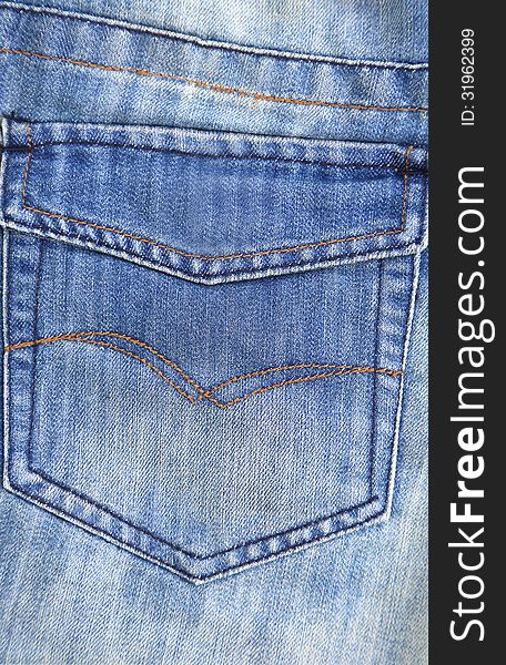 Jeans texture. Hip pocket. Close-up. Whole background.