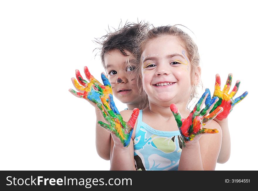 Smiley preschooler boy and girl showing their painted hands. Smiley preschooler boy and girl showing their painted hands