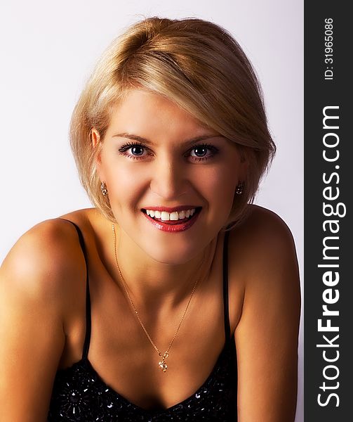 Portrait of a beautiful young smiling woman. Portrait of a beautiful young smiling woman