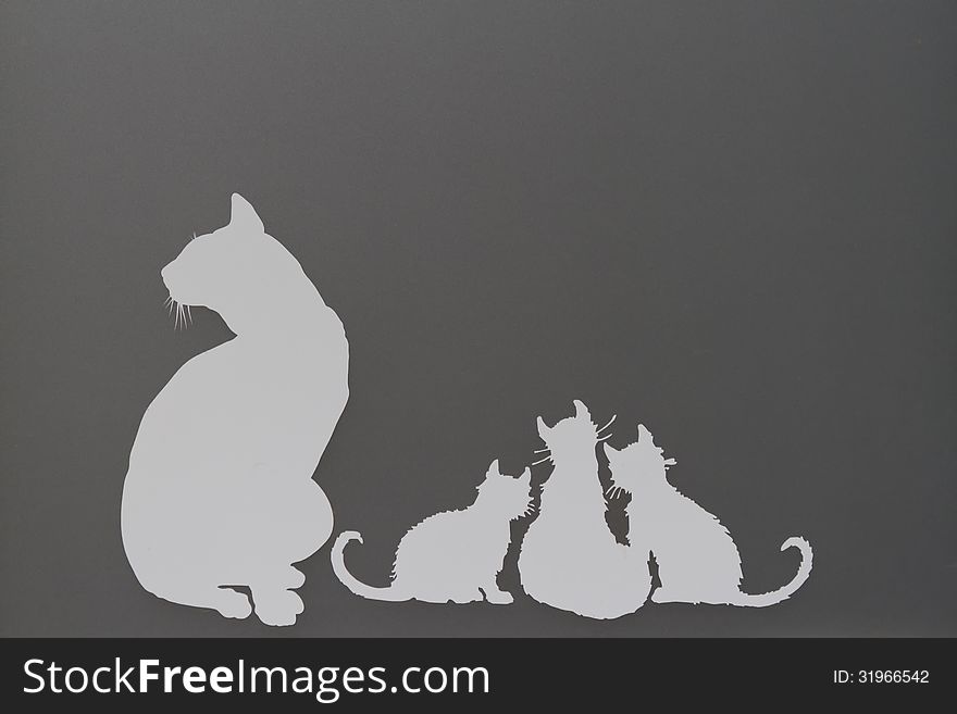 White cats silhouette on a grey background. White cats silhouette on a grey background