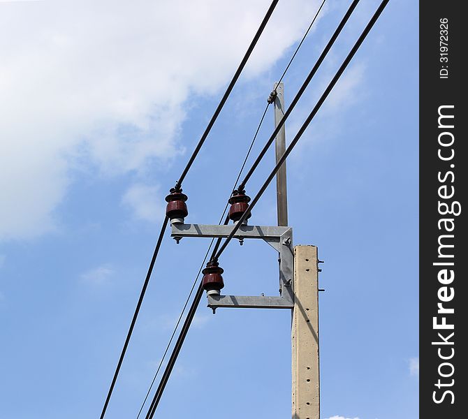 High voltage electric pole on sky background