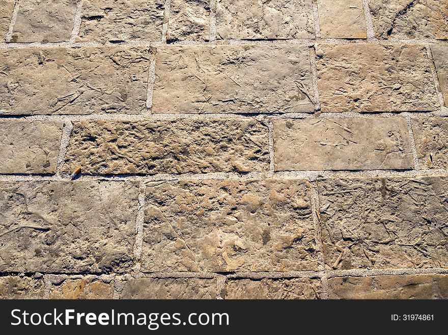 Ancient cobblestone pavement background from Budva old city. Ancient cobblestone pavement background from Budva old city