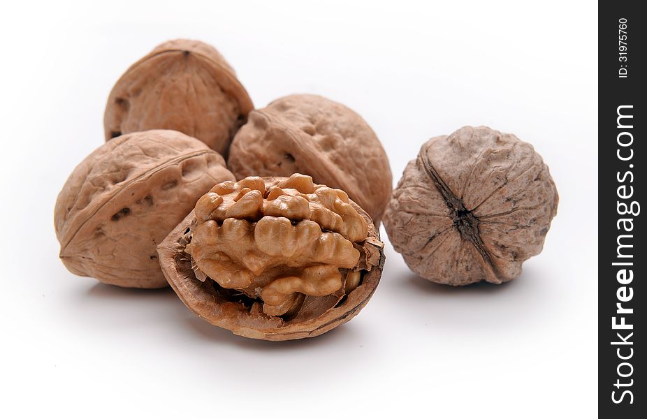 Walnuts on a white backgroundg