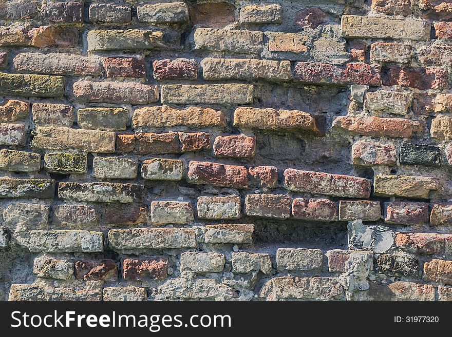 Medieval fortress antique brick rampart detail.