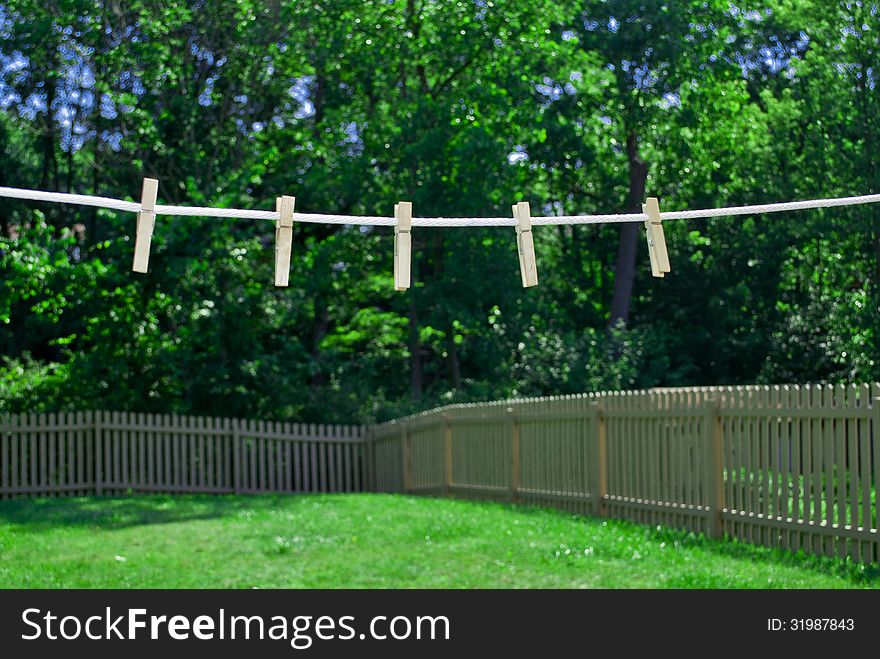 Clothes line hanging in summer backyard. Clothes line hanging in summer backyard