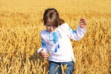 Rural Girl On Wheat Field Royalty Free Stock Photography