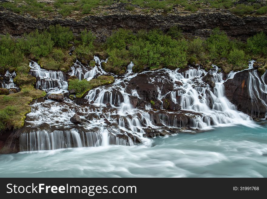 Summer picture of Hraunfossar waterfall in Iceland