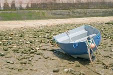 Tied Down Boat With Low Tide In The Bay Of Cadiz Stock Photo Tied Down Boat With Low Tide In The Bay Of Cadiz Stock Photo