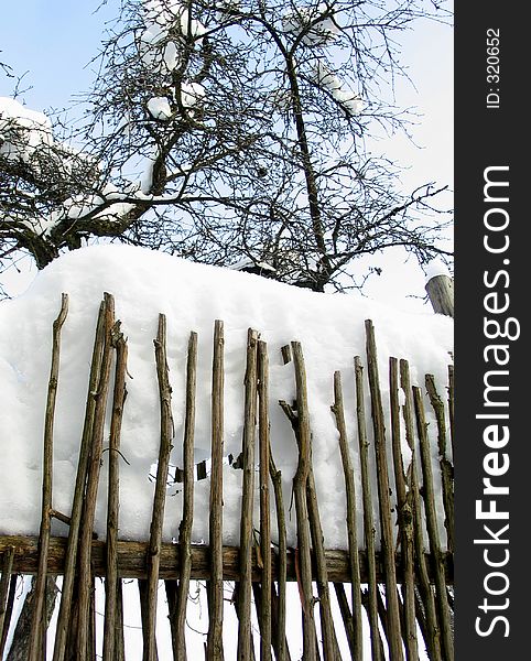 Snowdrift on a fence