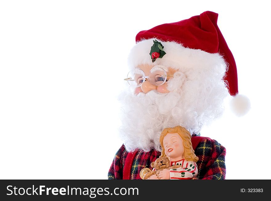 Santa Claus doll over a white background.