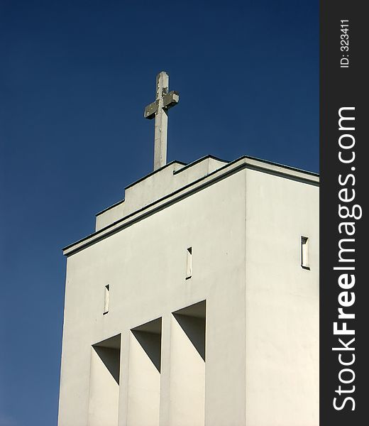 White church building against clear blue sky