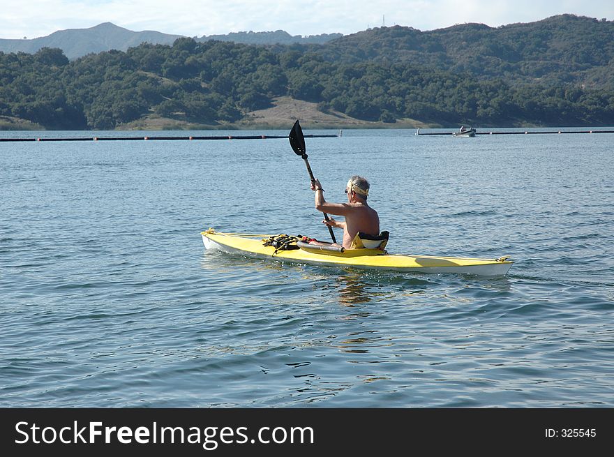 Man on kayak on the lake. Man on kayak on the lake