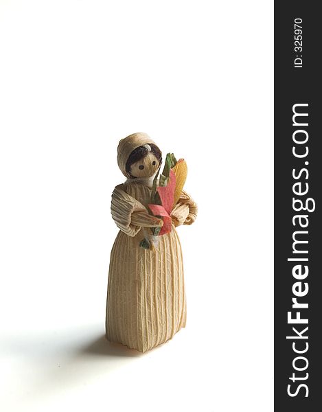 A small paper ornament of a peasant woman. A small paper ornament of a peasant woman.