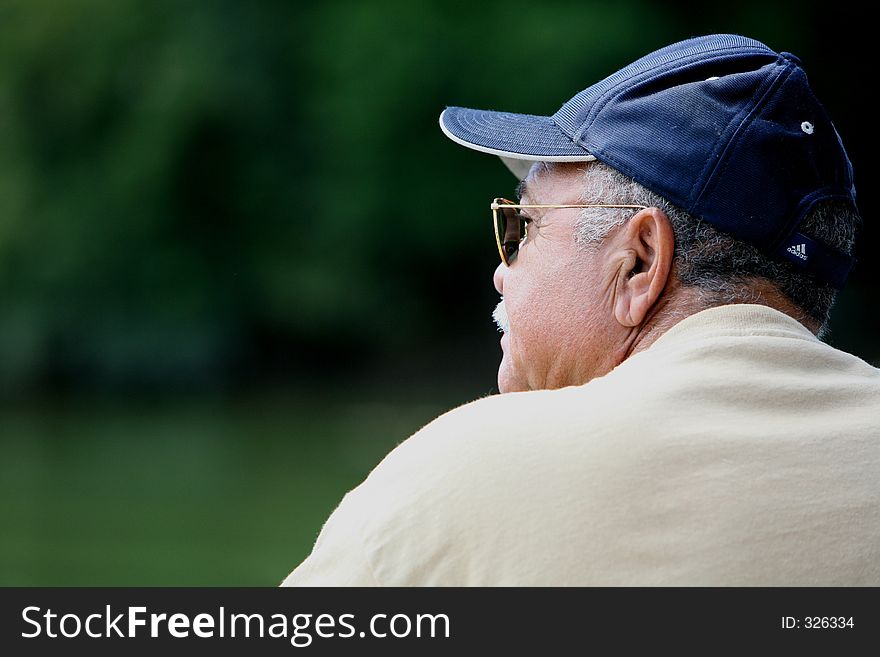 Old fisherman in the lake. Old fisherman in the lake