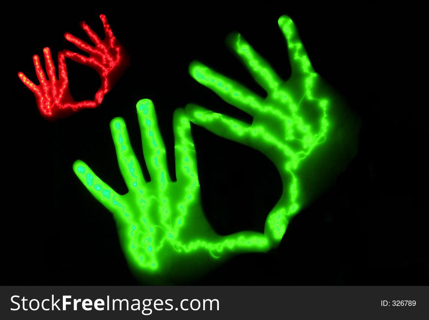 Couple of glowing hands. Couple of glowing hands