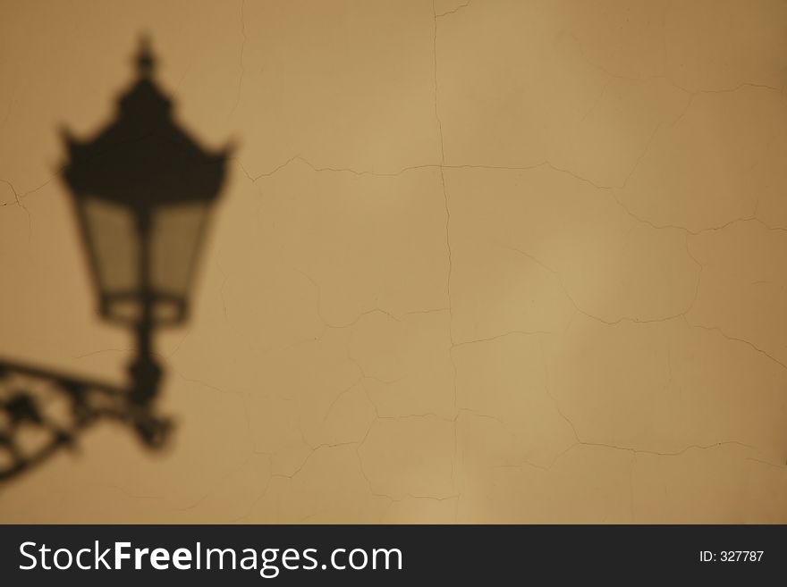 Shadow Of The Lamp On Wall