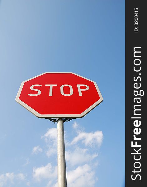 Stop sign. white text stop in red plate. Stop sign. white text stop in red plate