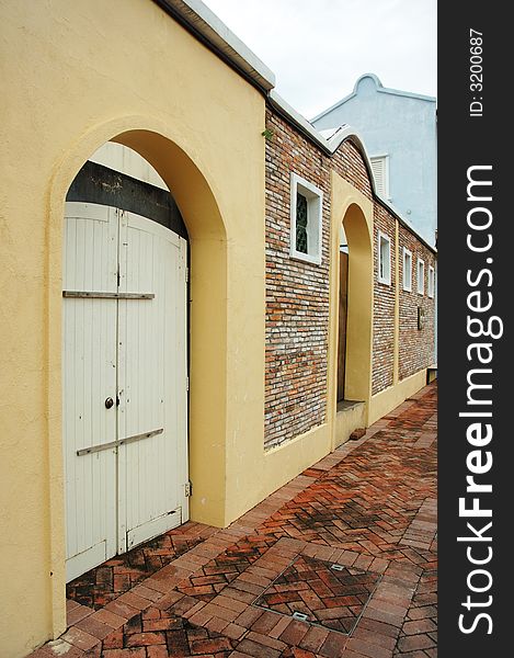 Old walk way with antique brick wall. Old walk way with antique brick wall