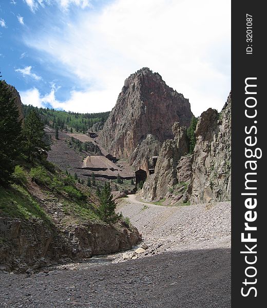 Less than a half mile out of Creede this dirt road leads to many old mines that perch up on the rock formations. Less than a half mile out of Creede this dirt road leads to many old mines that perch up on the rock formations.