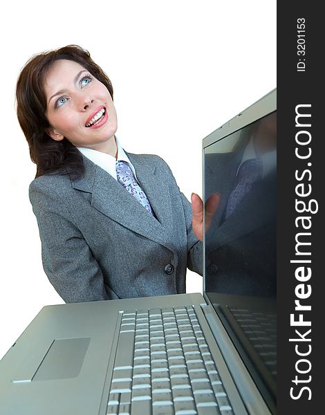 Smiling girl with laptop in her hands. Isolated on white background