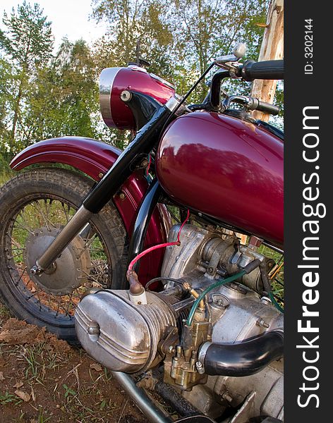 Dark-red russian renewed retro motorcycle