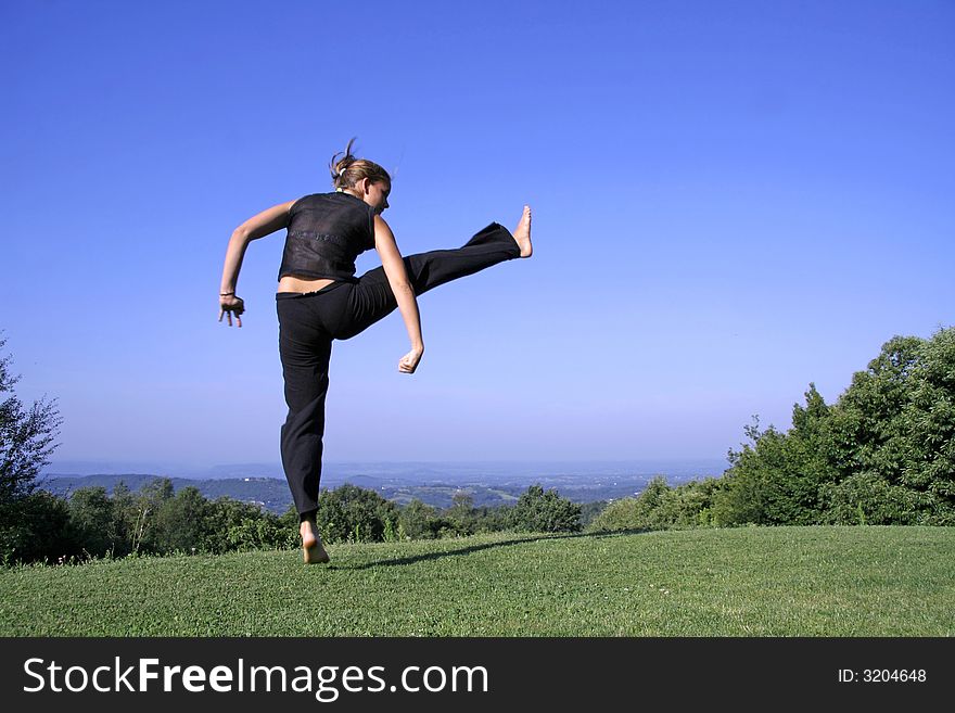 Woman practising self defense