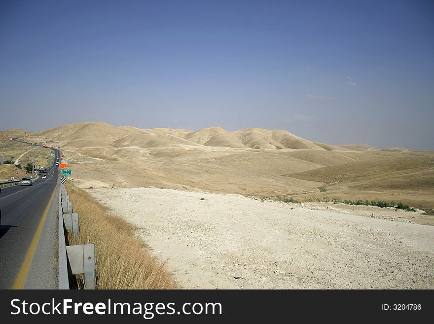 Car on desert road