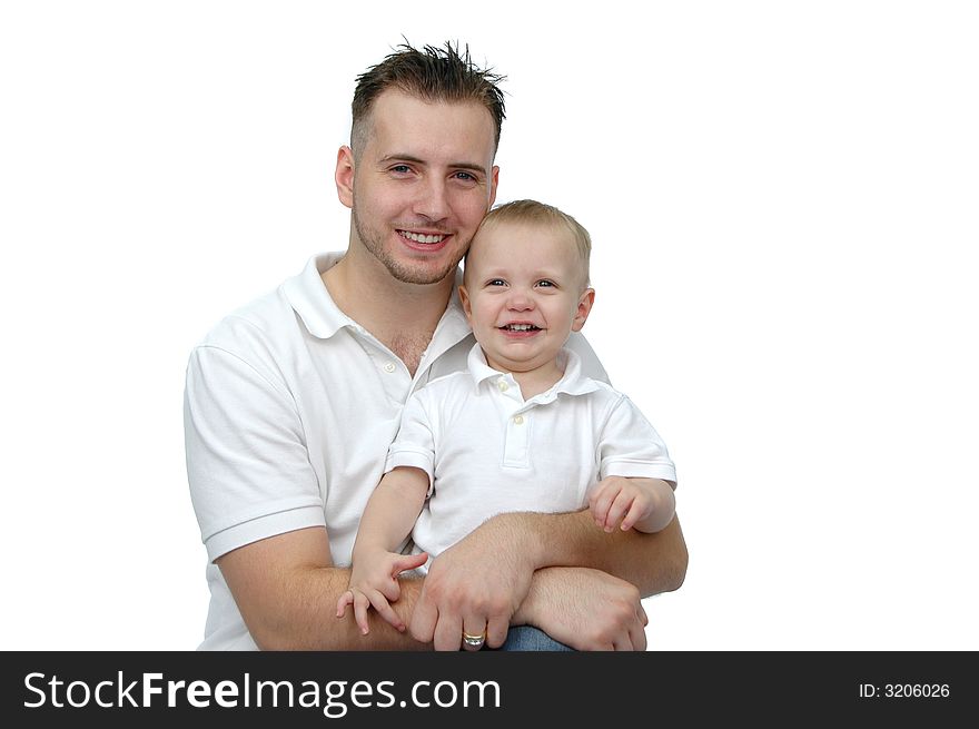 Father and son wearing white and smiling