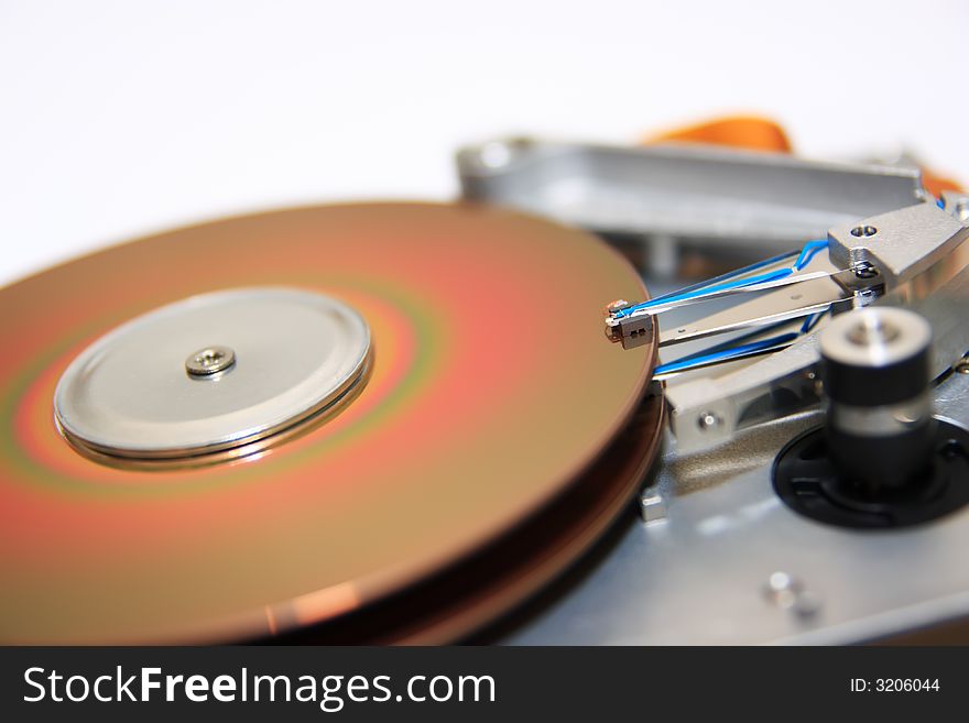 Close-up view of head and disk of HDD. Close-up view of head and disk of HDD