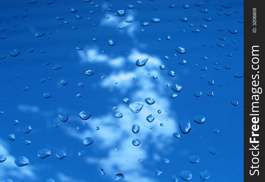 Simple shot of water drops on a window. Simple shot of water drops on a window.