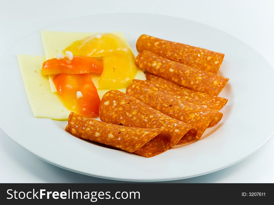 Breakfast with Sausage,Cheese ,red and yellow pepper.