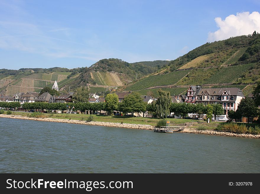 German village and vineyards along the Rhine River.