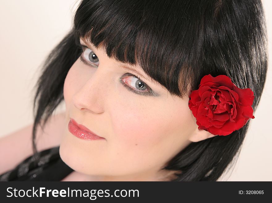 Beautiful girl with black hair and red rose. Beautiful girl with black hair and red rose