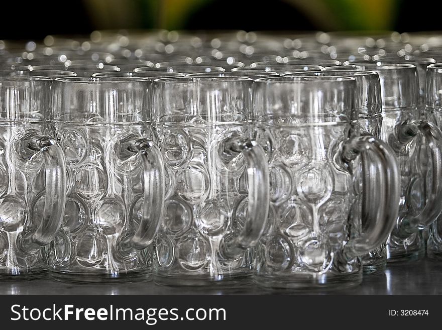 Many empty 1 liter beer mass as used at Munich's Oktoberfest. Many empty 1 liter beer mass as used at Munich's Oktoberfest