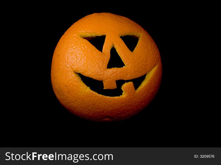 Pumpkin for a holiday Halloween, made of an orange. Pumpkin for a holiday Halloween, made of an orange.